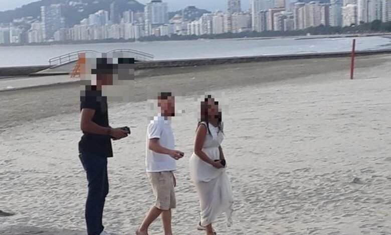 Casal usa praias fechadas para fazer book pré-nupcial