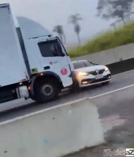 VÍDEO - Caminhoneiro se vinga de bandidos e arrasta carro na Anhanguera