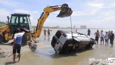 VÍDEO - Operação resgate: carro atolado é retirado da praia