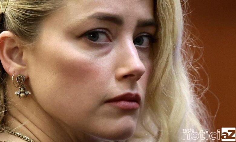 Amber Heard pode escrever livro sobre relacionamento com Johnny Depp