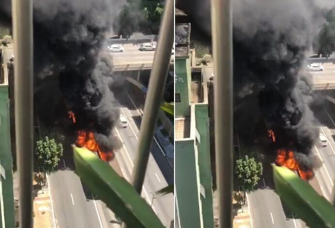 VÍDEO – Ônibus articulado pega fogo em avenida movimentada